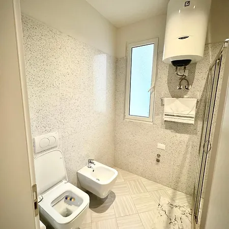 Roman Apartments شقة *